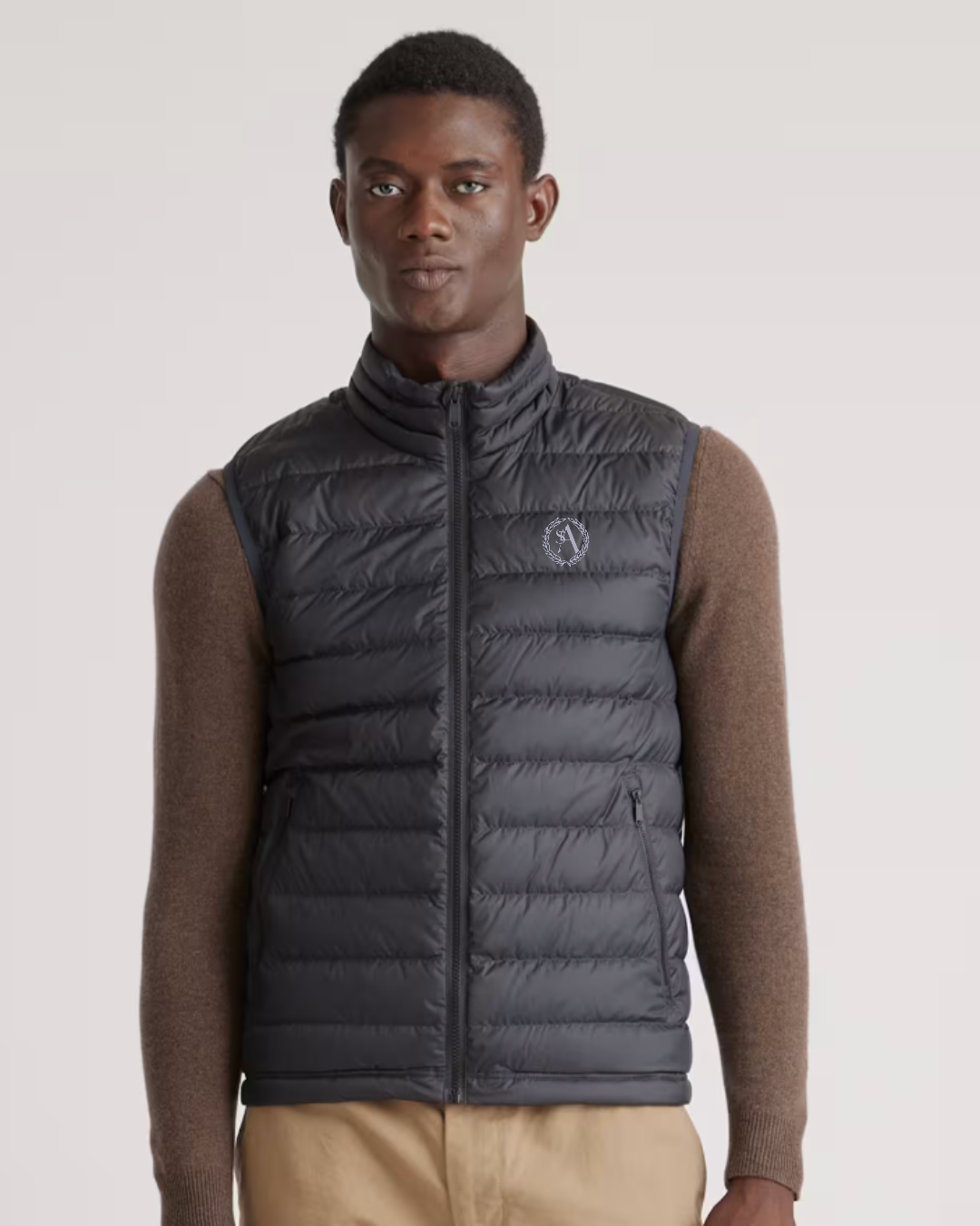 Men's Black Lightweight Down Packable Puffer Vest with Embroidered Crest